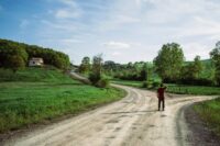 person at crossroads uncertain showing the struggle of learning how to trust yourself
