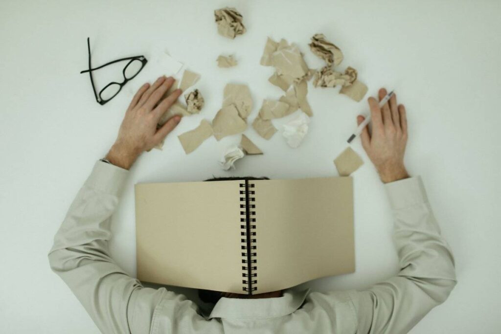 person surrounded by choices and possibilities showing why it is hard to find a purpose in life