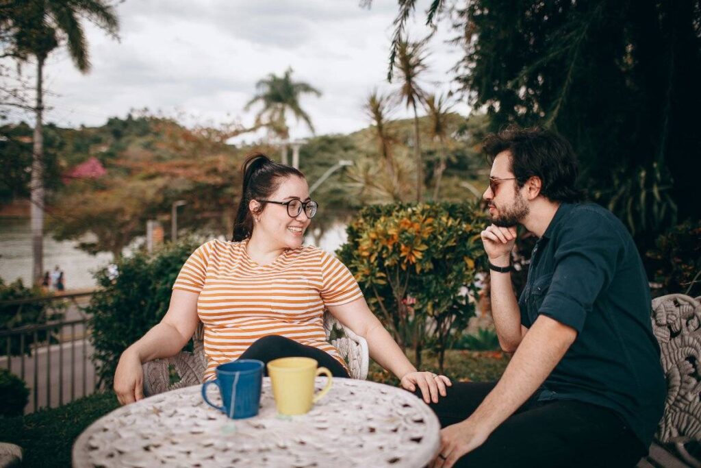 two people handling disagreement with care showing how to have a healthy relationship through conflict