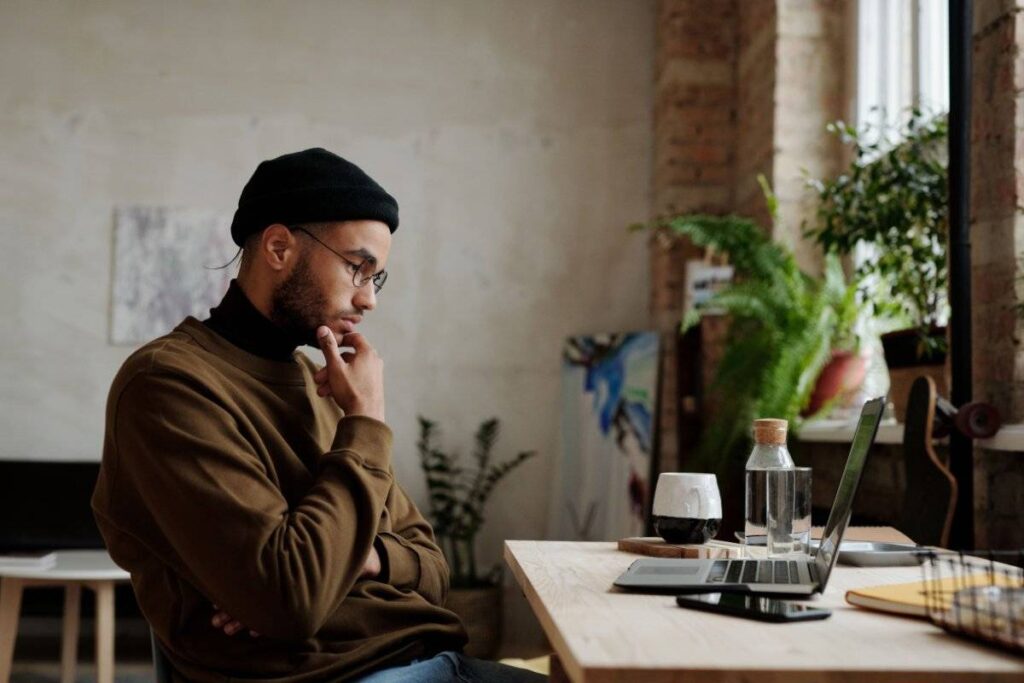 person absorbed in creative work showing the engagement that points toward how to find a purpose in life