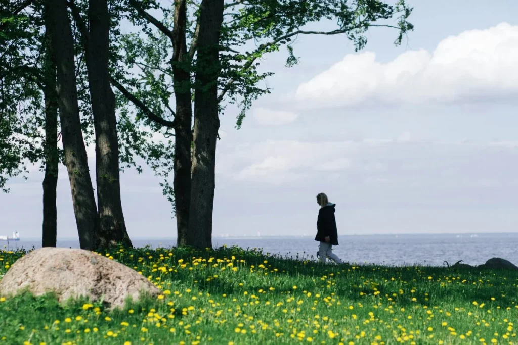 person walking in nature as physical movement for overthinking therapy