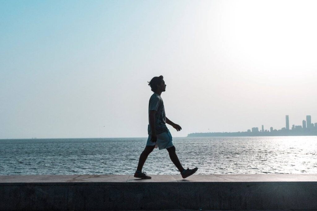 person walking forward with quiet confidence after learning how to trust yourself