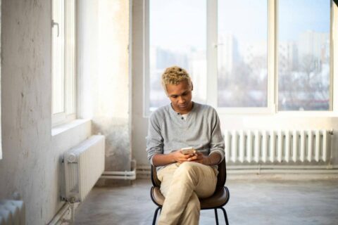 person waiting anxiously for approval struggling with how to stop seeking validation
