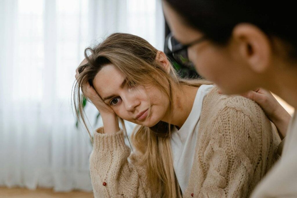 two people having honest supportive conversation about how to deal with rejection