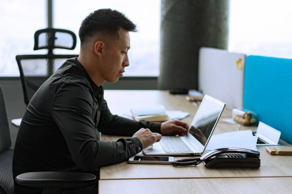 person working steadily and calmly showing what it means to learn how to be more patient