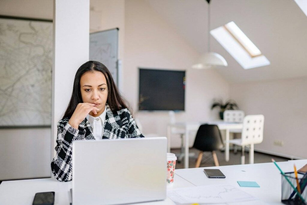 person working alone with focus and confidence after learning how to stop seeking validation