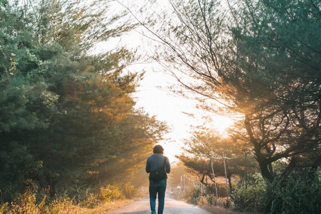 person walking forward with purpose after finding how to get motivated