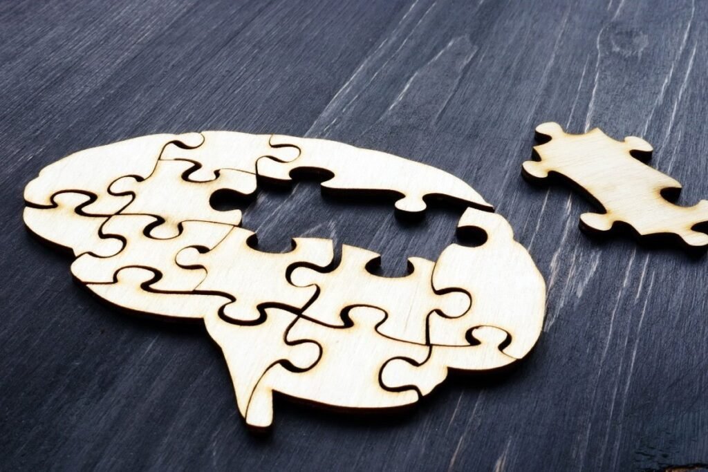 Maintaining mental health illustrated with a brain puzzle, symbolizing balance, clarity, and mental well-being.