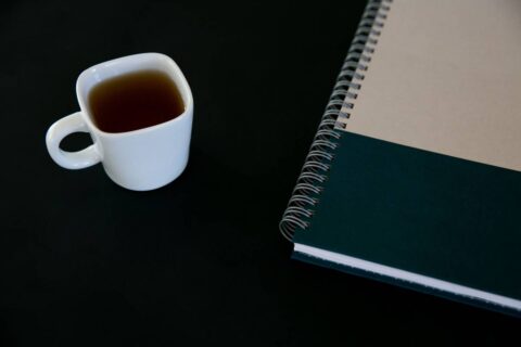 person beginning small morning habit showing the quiet modest start needed to learn how to build good habits