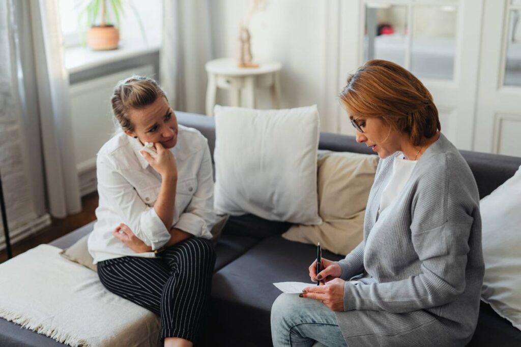 person talking openly with therapist showing one path to understanding why do i feel sad for no reason