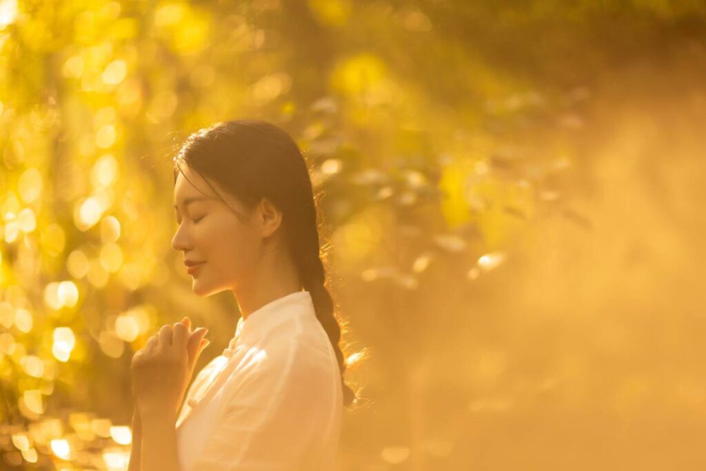 person calm in morning light showing the peace that comes after understanding why do i feel sad for no reason