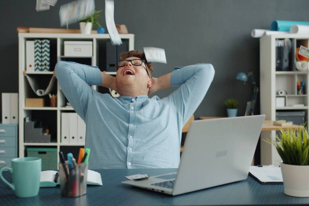 person quietly satisfied after focused work session showing the result of learning how to focus better
