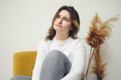 person with tender open expression showing the honest texture of sensitivity when learning how to be less sensitive