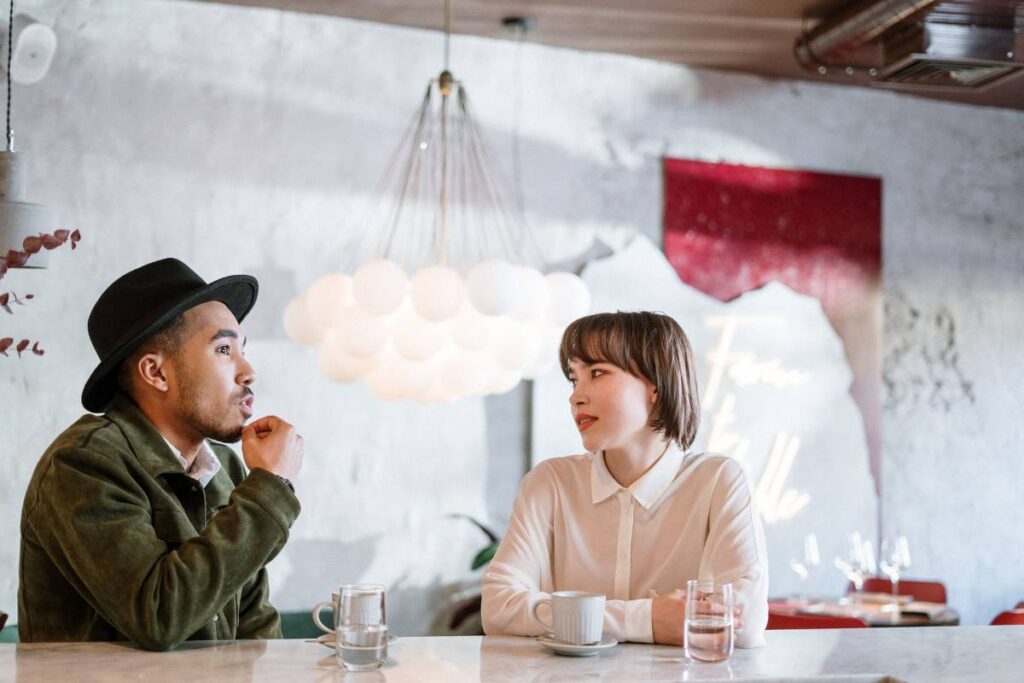 person pausing deliberately mid-conversation showing the crucial gap in how to deal with anger