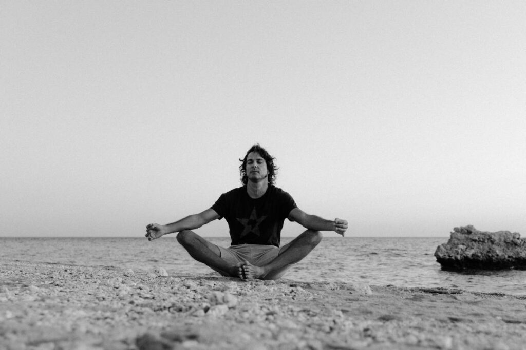 person calm and settled showing the earned steadiness that comes from learning how to break a bad habit