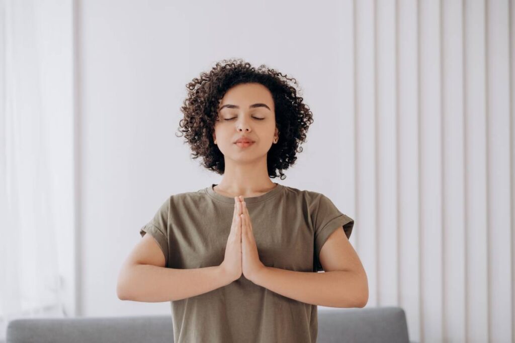 person calm and confident showing the earned stability that comes from learning how to be less sensitive