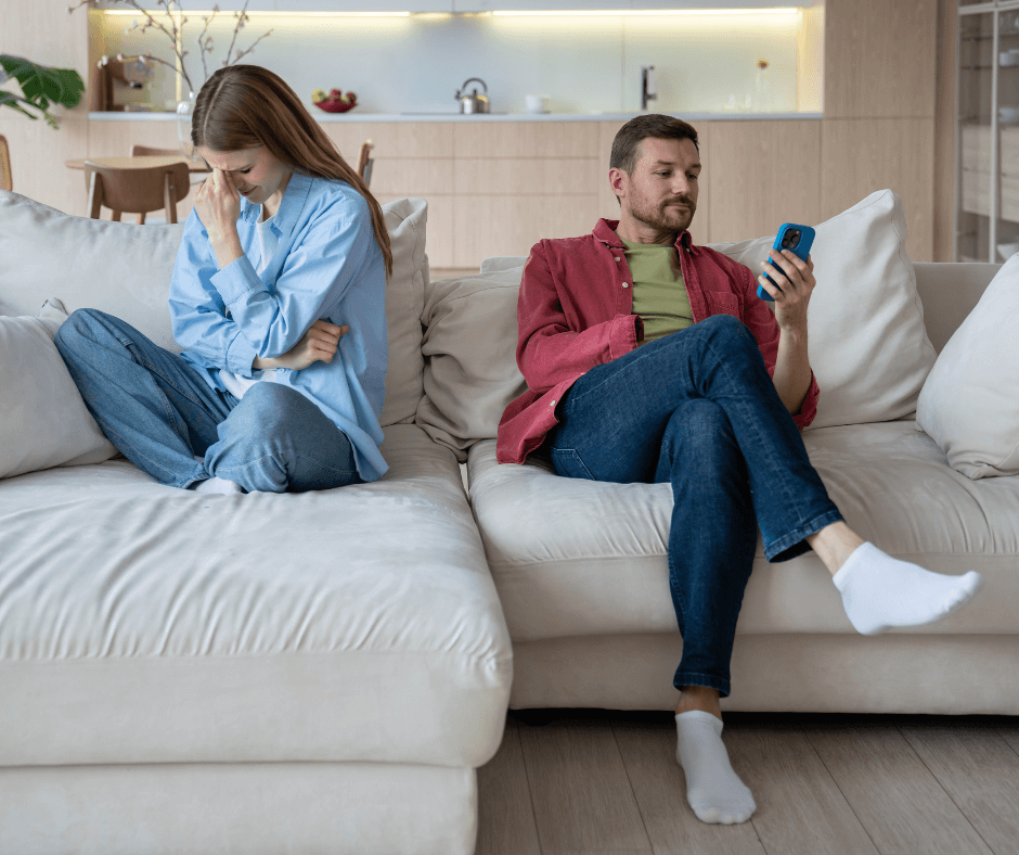 Emotionally distant couple sitting in silence — signs of narcissistic abuse in a toxic relationship