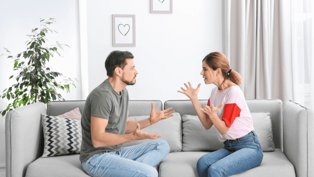 Couple discussing how to handle relationship problems in a healthy way while improving communication and rebuilding trust.
