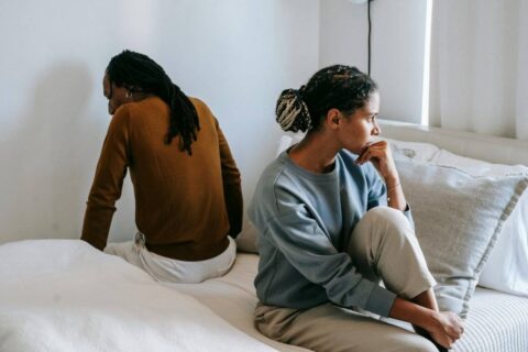 couple sitting in silence showing signs of an unhealthy relationship