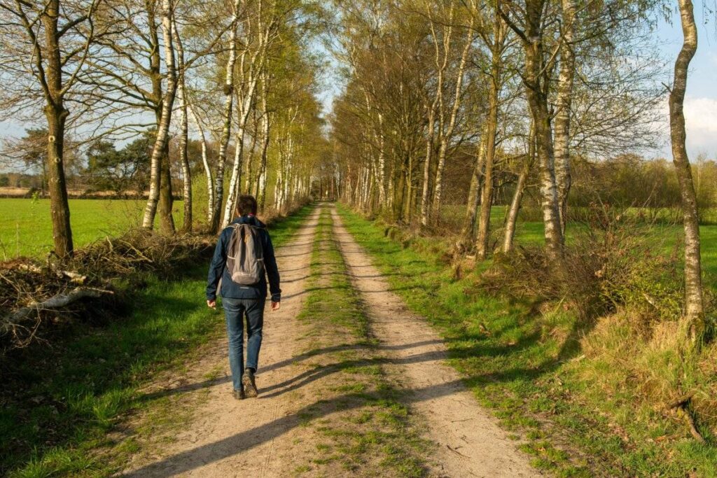 person walking away after recognizing signs of an unhealthy relationship