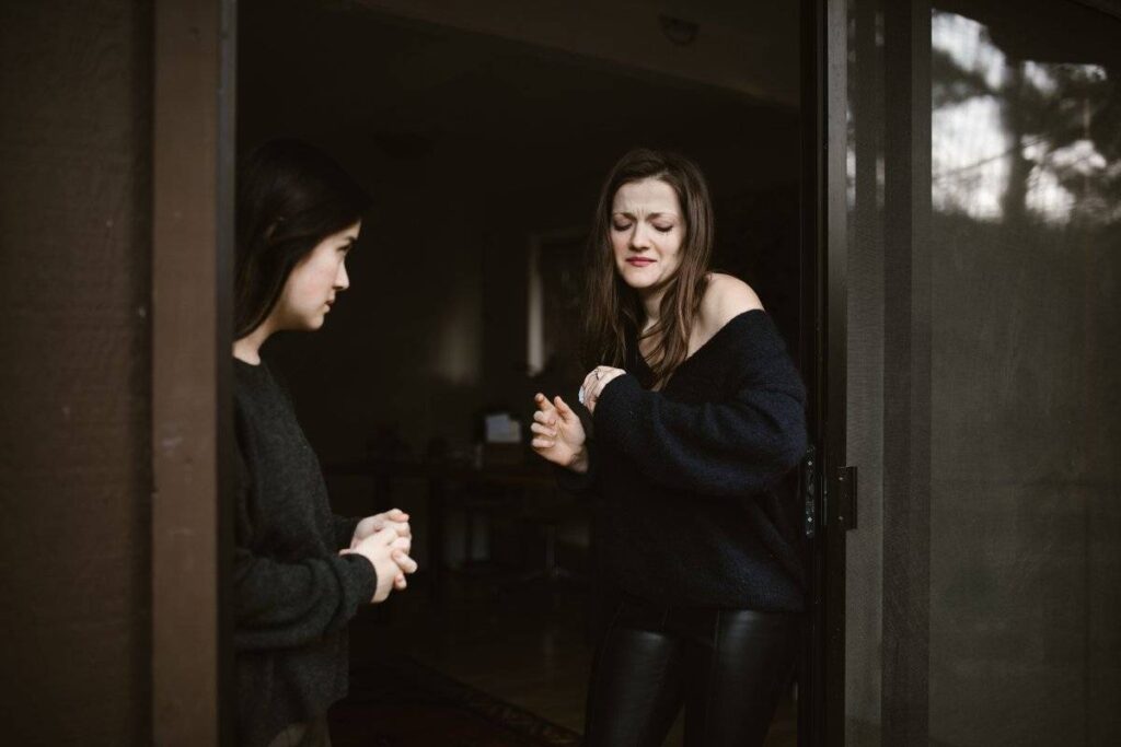 two people in honest conversation showing how to deal with jealousy through open communication
